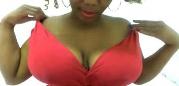  Mature ebony in pink dress sucks dildo on webcam  - more videos on dslwebcam.com
